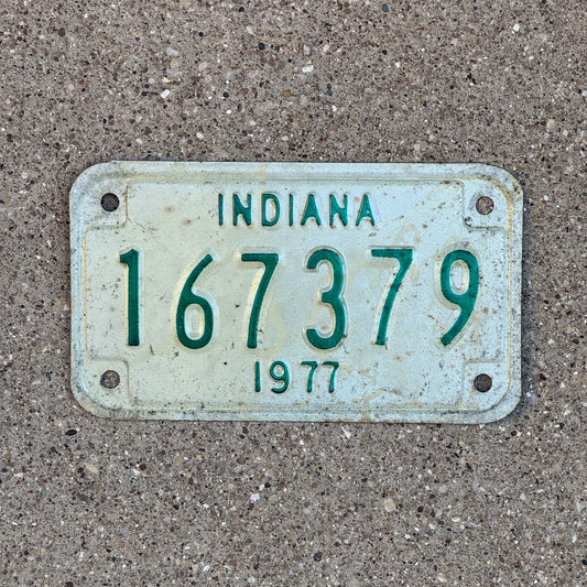 Photo of a 1977 Indiana Motorcycle License Plate Auto Tag Garage Decor Vintage 167379 with original patina