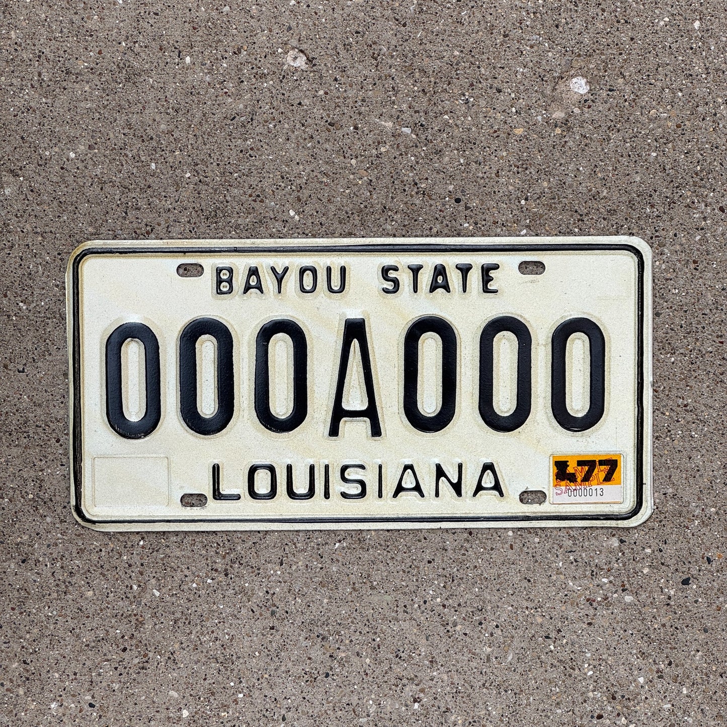 Photo of a 1977 Louisiana SAMPLE License Plate Auto Tag Garage Decor Vintage 000 A 000
