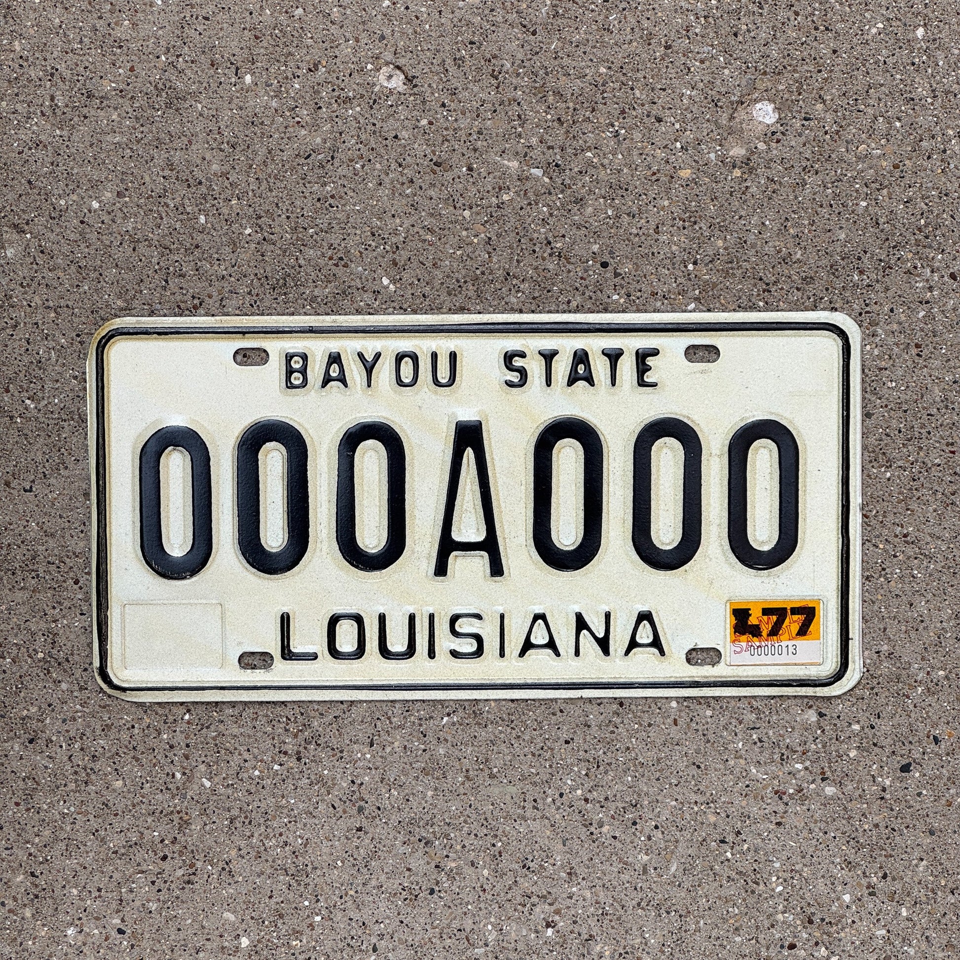 Photo of a 1977 Louisiana SAMPLE License Plate Auto Tag Garage Decor Vintage 000 A 000