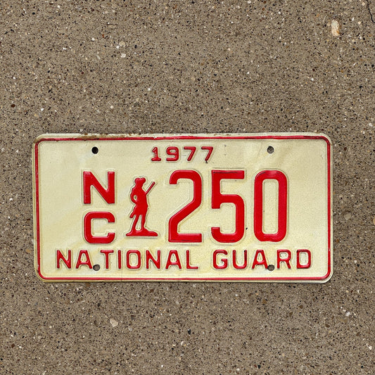Photo of a 1977 North Carolina National Guard License Plate Auto Tag Garage Decor Vintage NC 250