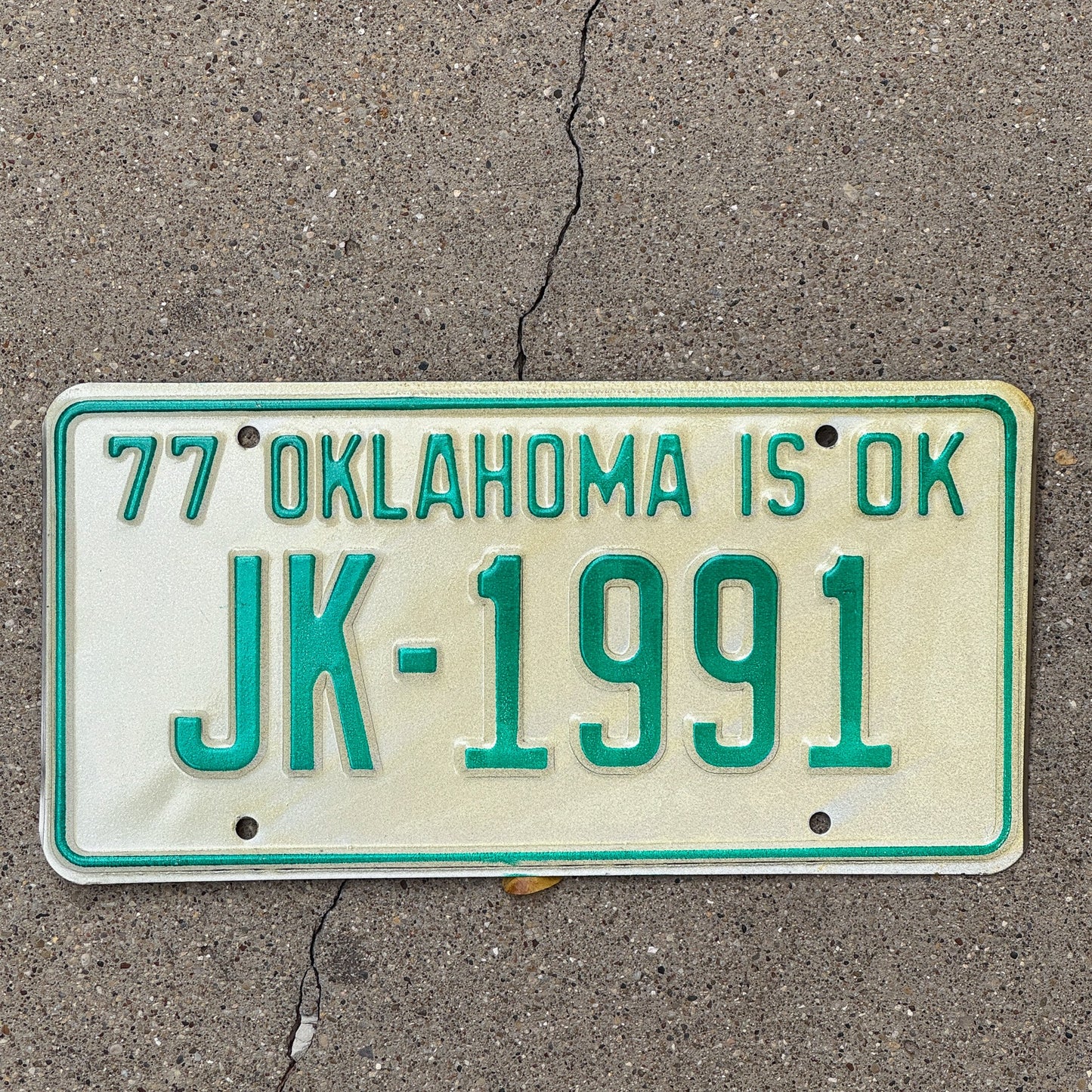 Photo of a 1977 Oklahoma License Plate Auto Tag Garage Decor Vintage Birth Year JK 1991 with original patina