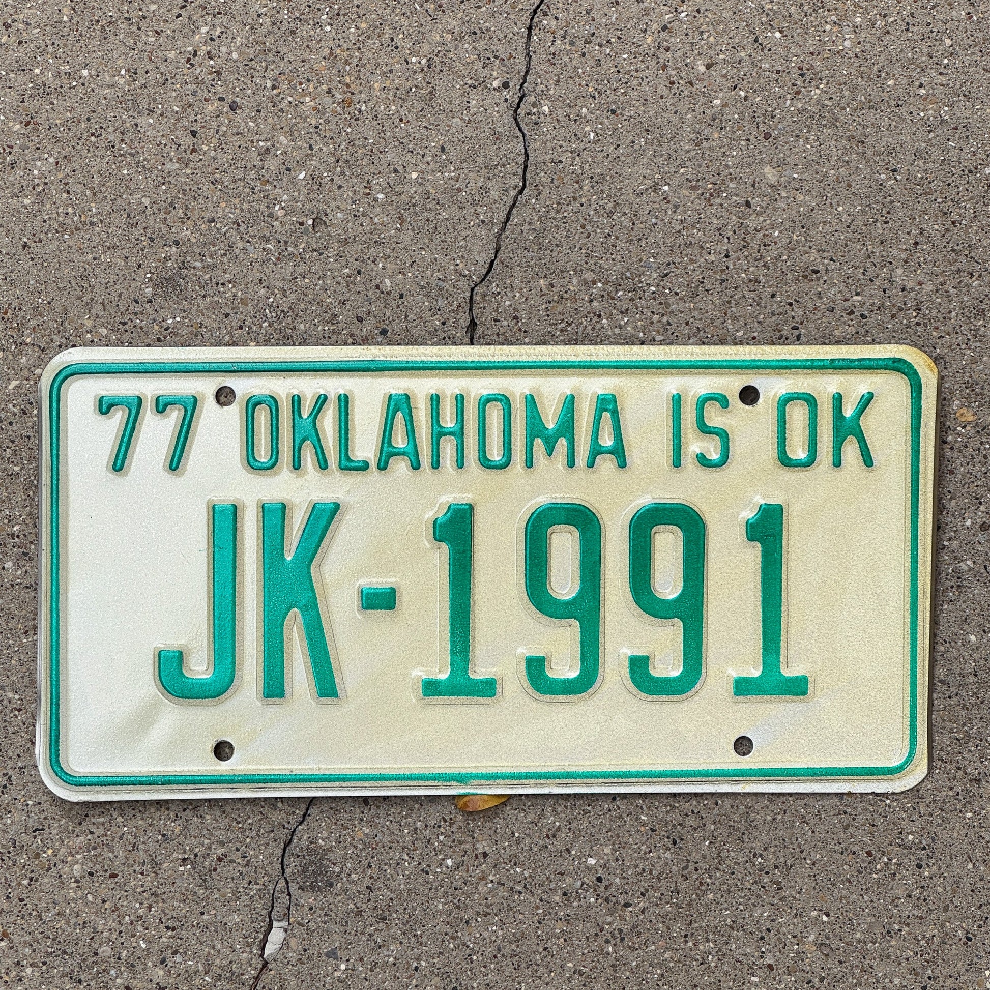 Photo of a 1977 Oklahoma License Plate Auto Tag Garage Decor Vintage Birth Year JK 1991 with original patina