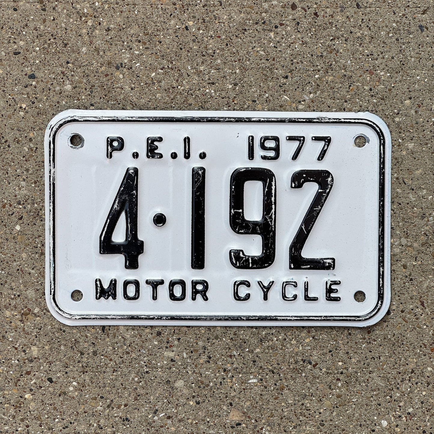 Photo of a 1977 Prince Edward Island Motorcycle License Plate Auto Tag Garage Decor Vintage 4192