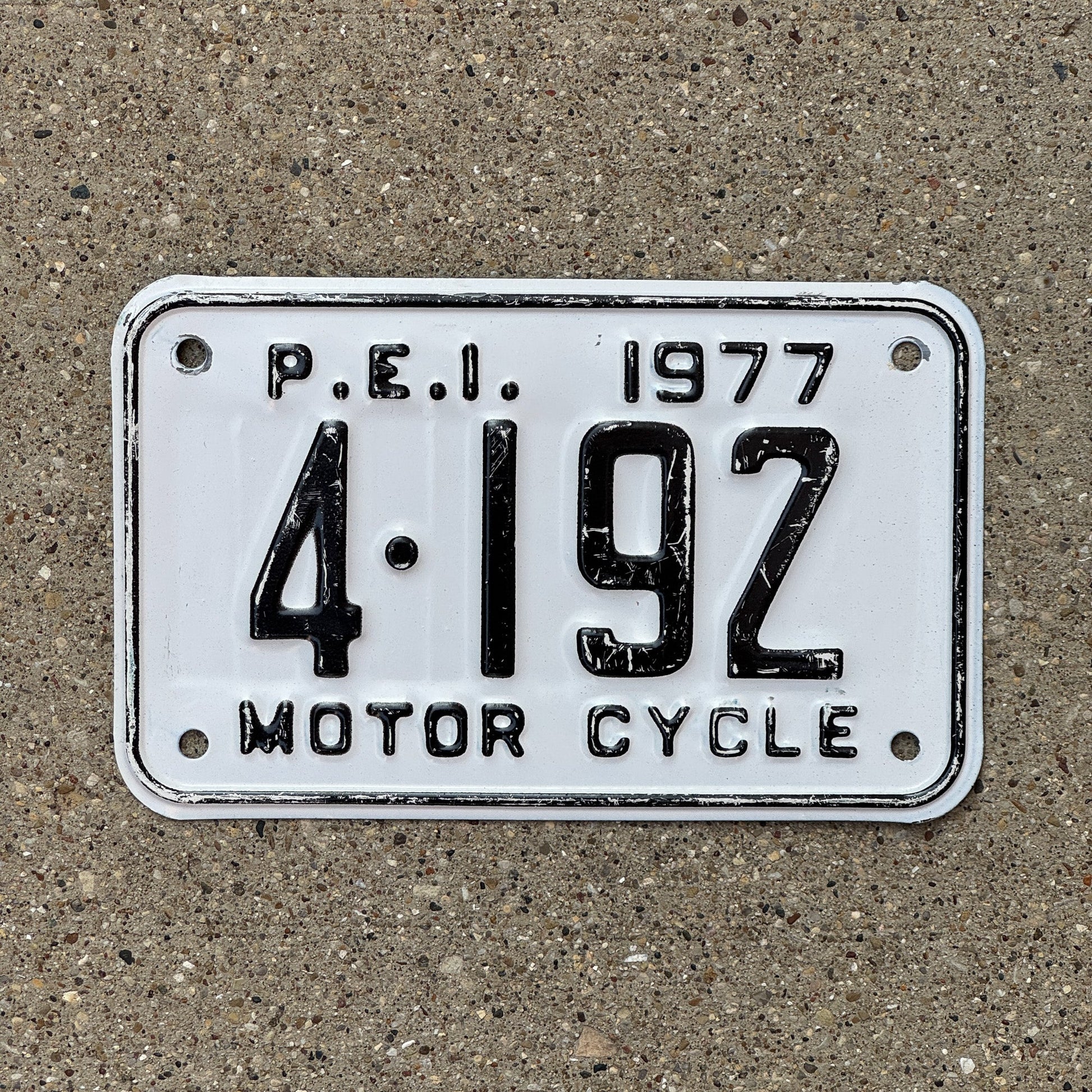 Photo of a 1977 Prince Edward Island Motorcycle License Plate Auto Tag Garage Decor Vintage 4192