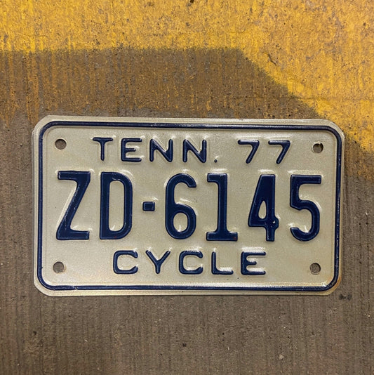 Photo of a 1977 Tennessee Motorcycle License Plate Auto Tag Garage Decor Vintage ZD 6145 with original patina