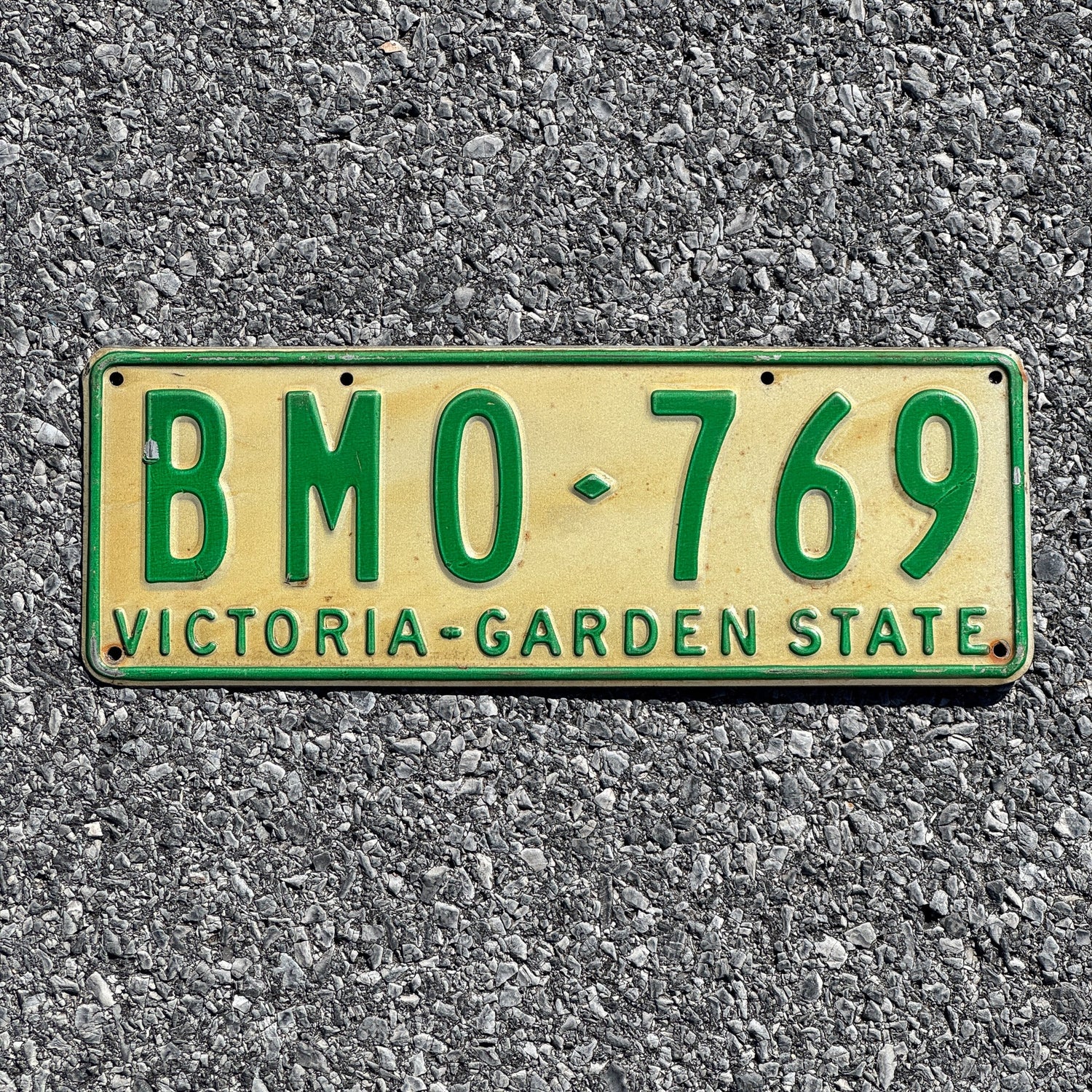 Photo of a 1977 Victoria License Plate Auto Tag Garage Decor Vintage BMO 769