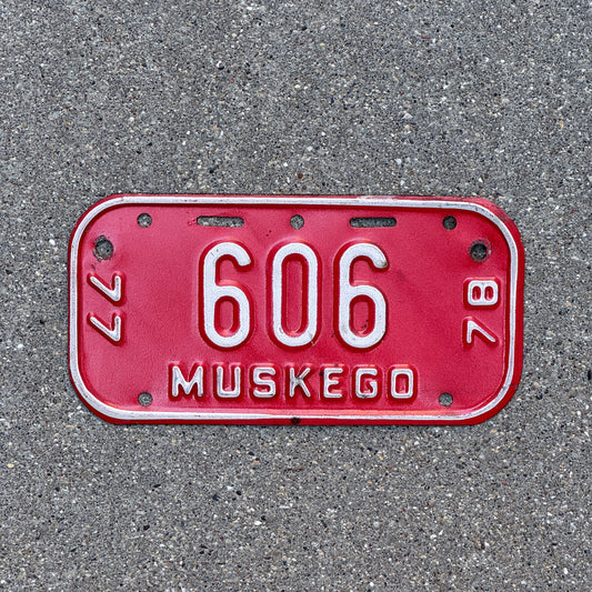 Photo of a 1977 Wisconsin Bicycle License Plate Auto Tag Garage Decor Vintage Muskego Bike 606 with original patina