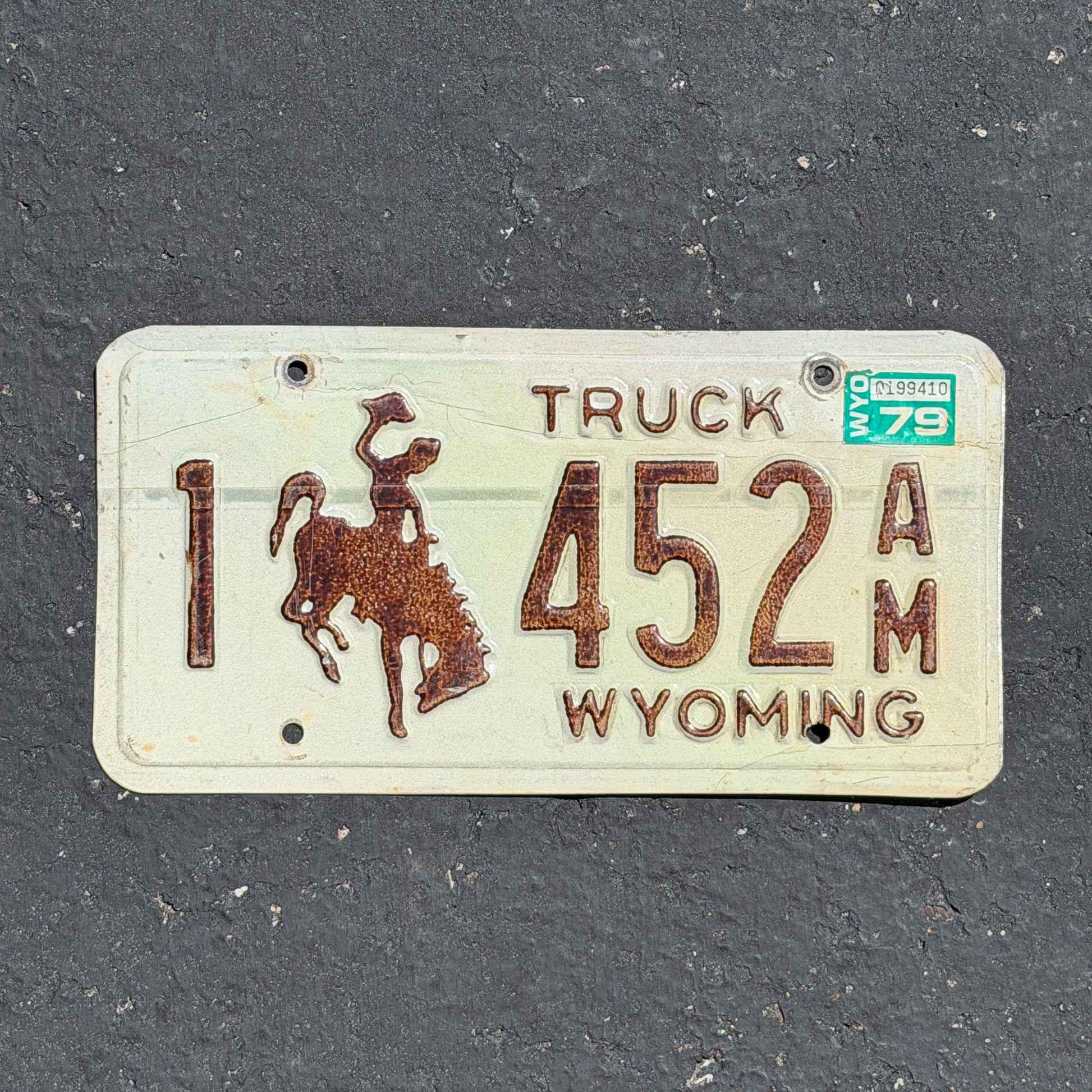 Photo of a 1978 1979 Wyoming Truck License Plate Auto Tag Garage Decor Vintage Cowboy Rodeo 1 452 AM with original patina