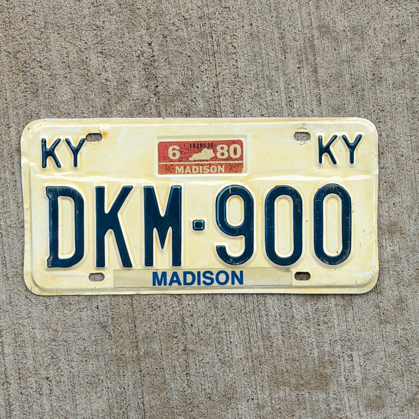 Photo of a 1978 1980 Kentucky License Plate Auto Tag Garage Decor Vintage DKM 900 with original patina