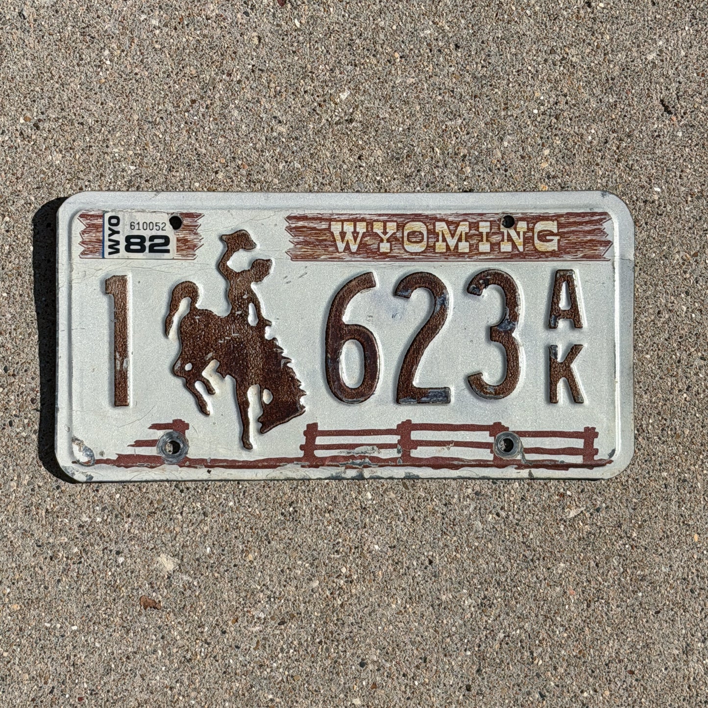 Photo of a 1978 1982 Wyoming License Plate Auto Tag Garage Decor Vintage Cowboy Rodeo 1 623 AK with original patina