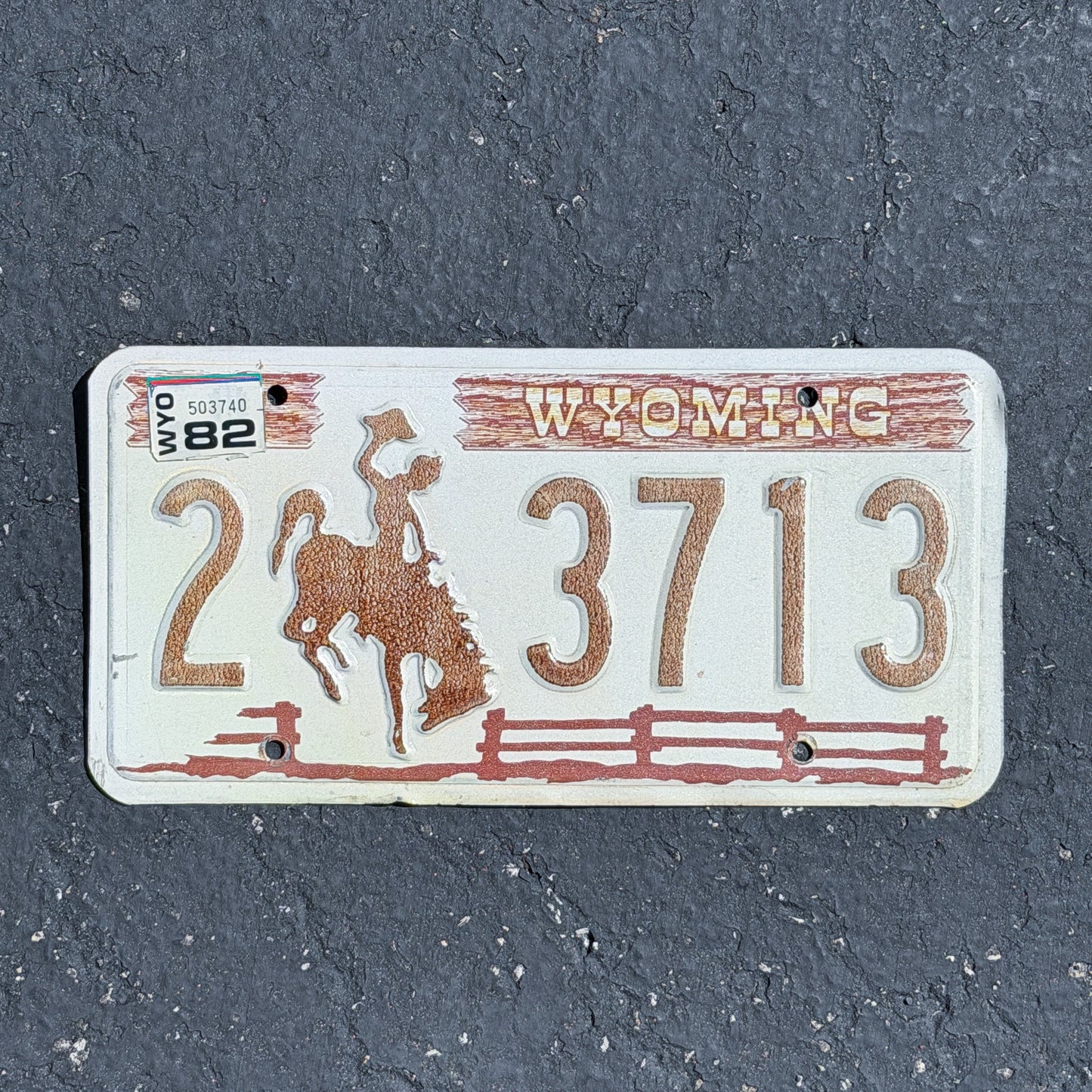 Photo of a 1978 1982 Wyoming License Plate Auto Tag Garage Decor Vintage Cowboy Rodeo 2 3713 with original patina