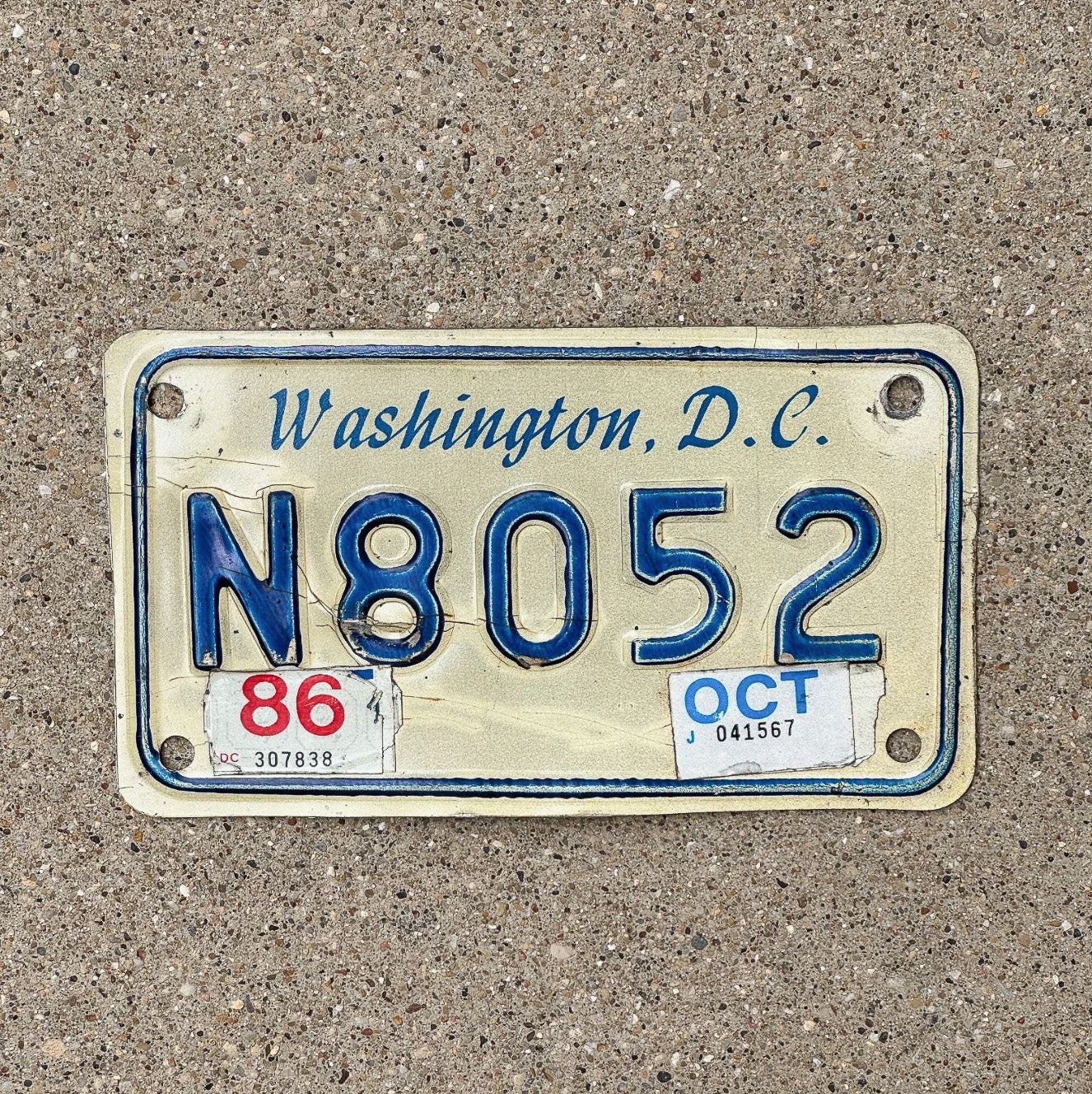 Photo of a 1978 1986 Washington DC Motorcycle License Plate Auto Tag Garage Decor Vintage N 8052 with original patina