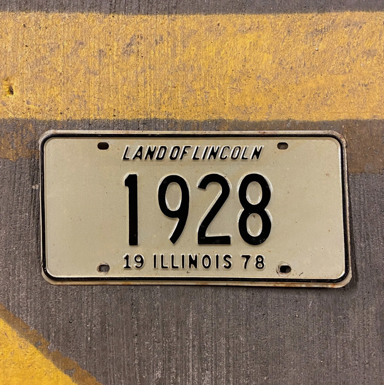 Photo of a 1978 Illinois License Plate Auto Tag Garage Decor Vintage Low Number Four Digit 1928 with original patina