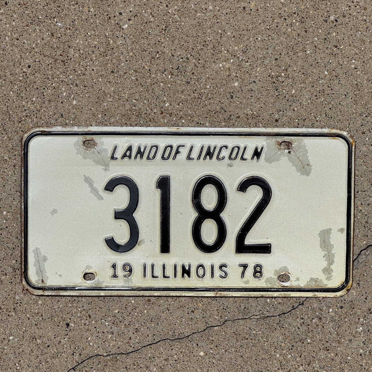 Photo of a 1978 Illinois License Plate Auto Tag Garage Decor Vintage Low Number Four Digit 3182 with original patina