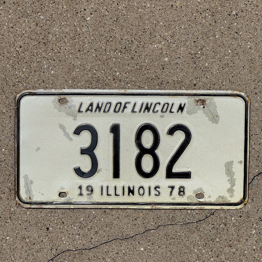 Photo of a 1978 Illinois License Plate Auto Tag Garage Decor Vintage Low Number Four Digit 3182 with original patina