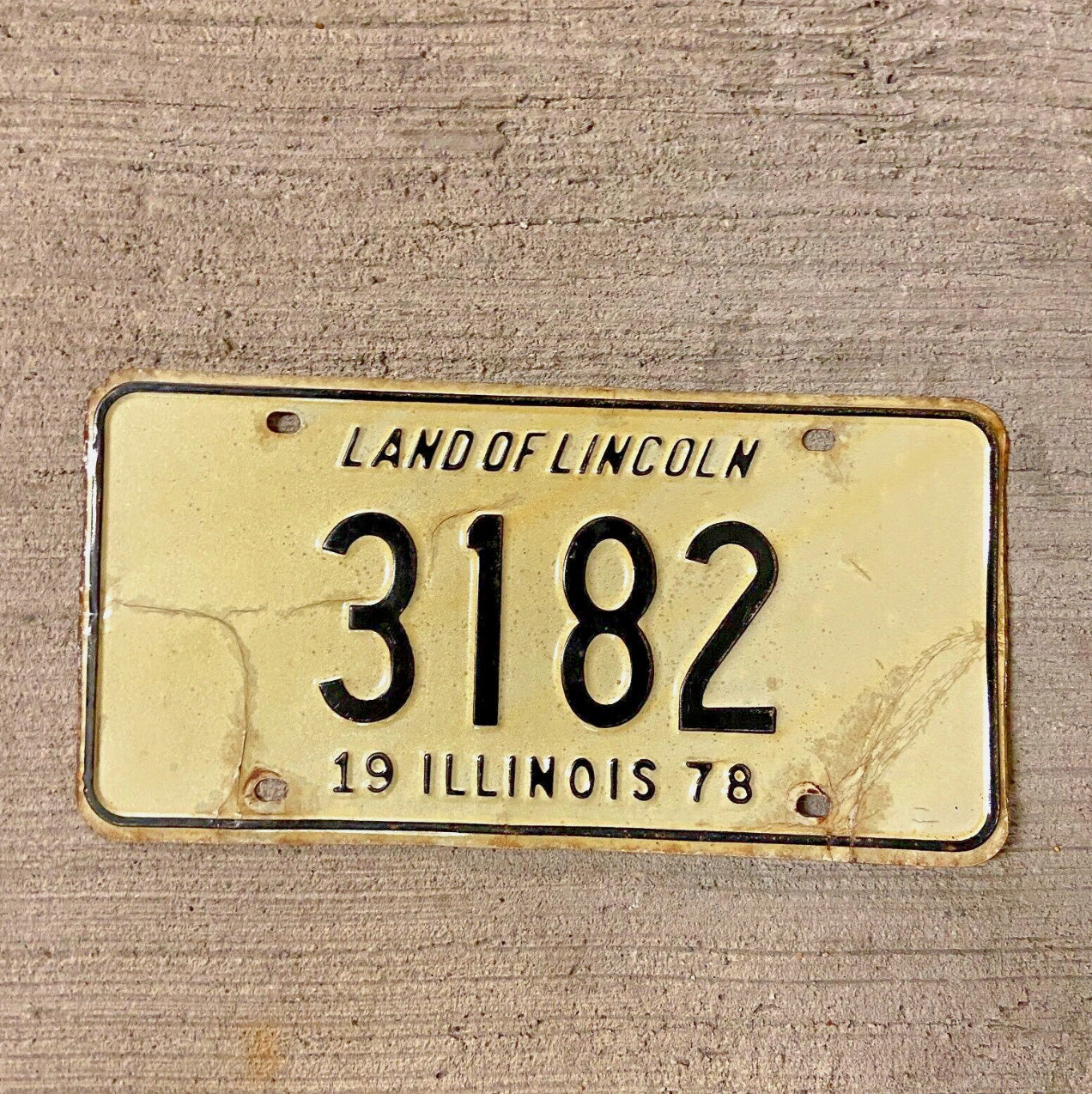 Photo of a 1978 Illinois License Plate Auto Tag Garage Decor Vintage Low Number Four Digit 3182 with original patina
