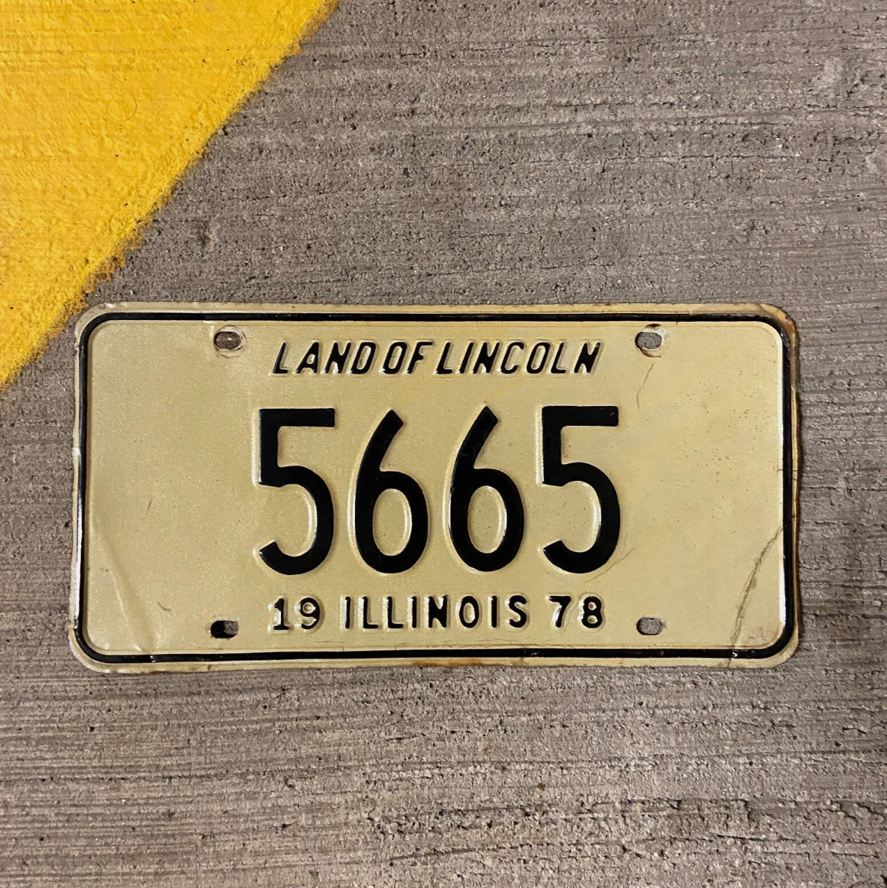Photo of a 1978 Illinois License Plate Auto Tag Garage Decor Vintage Low Number Four Digit 5665 with original patina