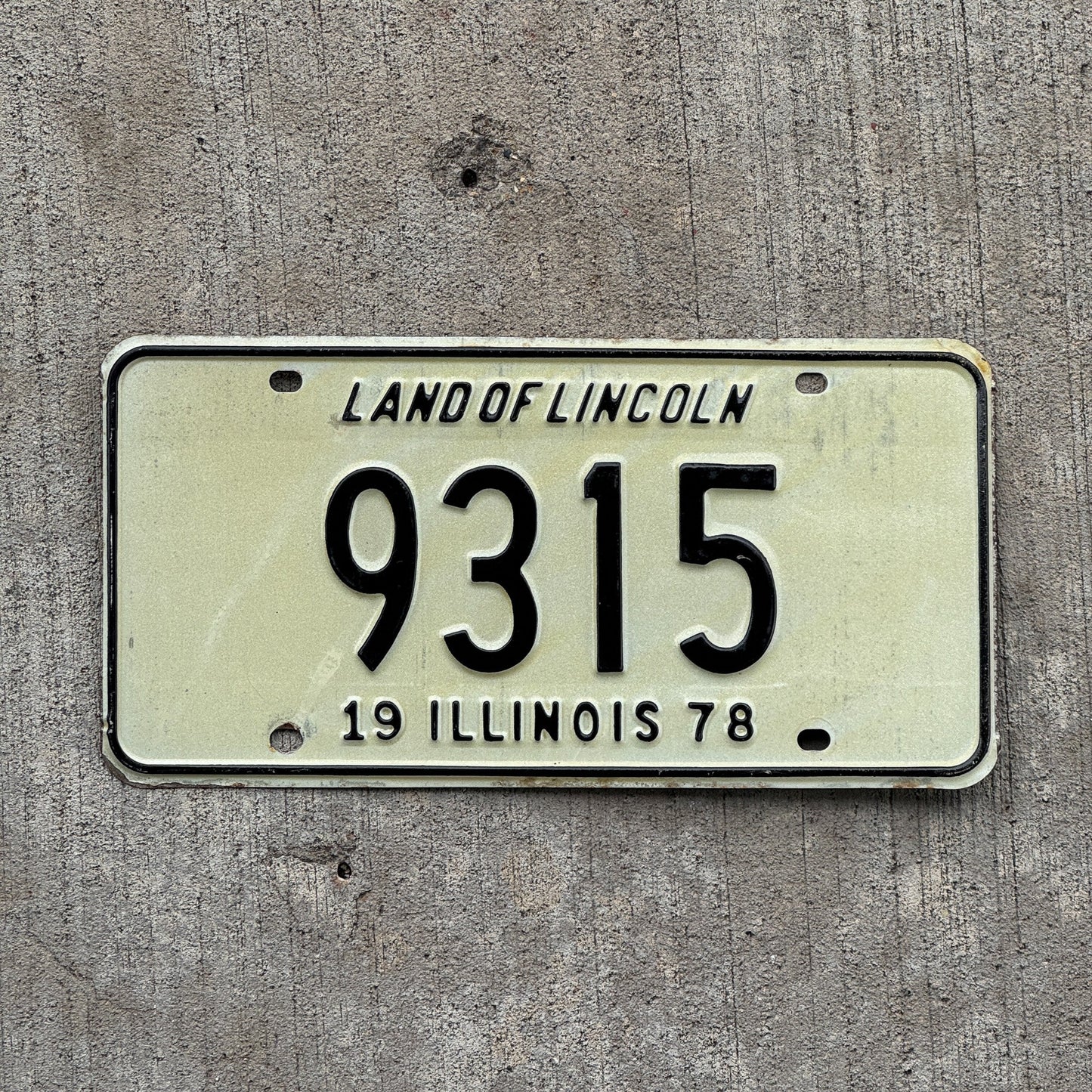 Photo of a 1978 Illinois License Plate Auto Tag Garage Decor Vintage Low Number Four Digit 9315 with original patina