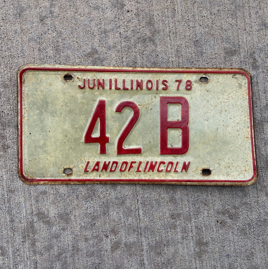 Photo of a 1978 Illinois Truck License Plate Auto Tag Garage Decor Vintage Low Number Two Digit 42 B with original patina