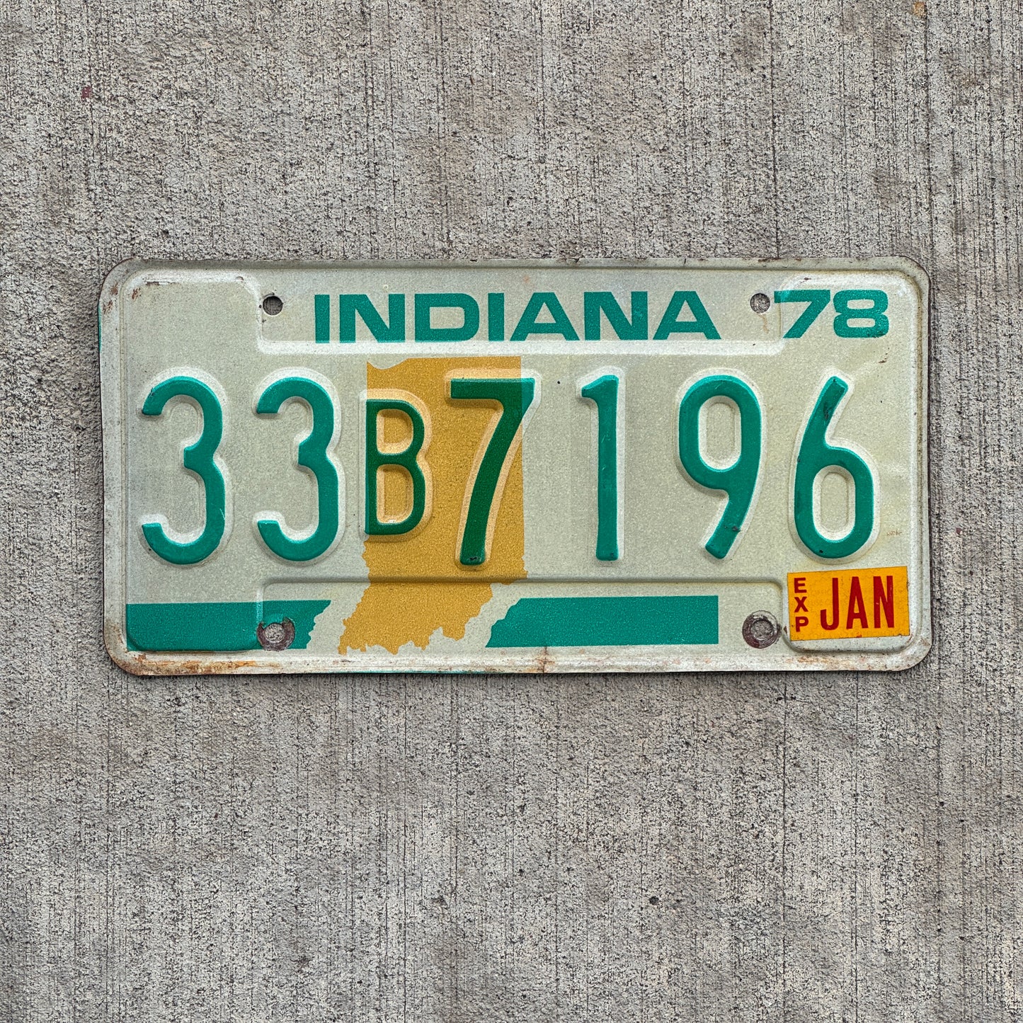 Photo of a 1978 Indiana License Plate Auto Tag Garage Decor Vintage 33 B 7196 with original patina