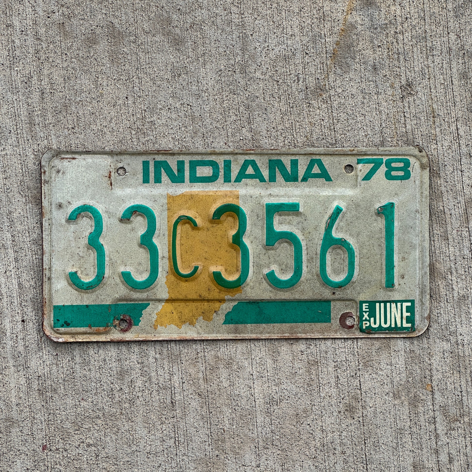Photo of a 1978 Indiana License Plate Auto Tag Garage Decor Vintage 33 C 3561 with original patina