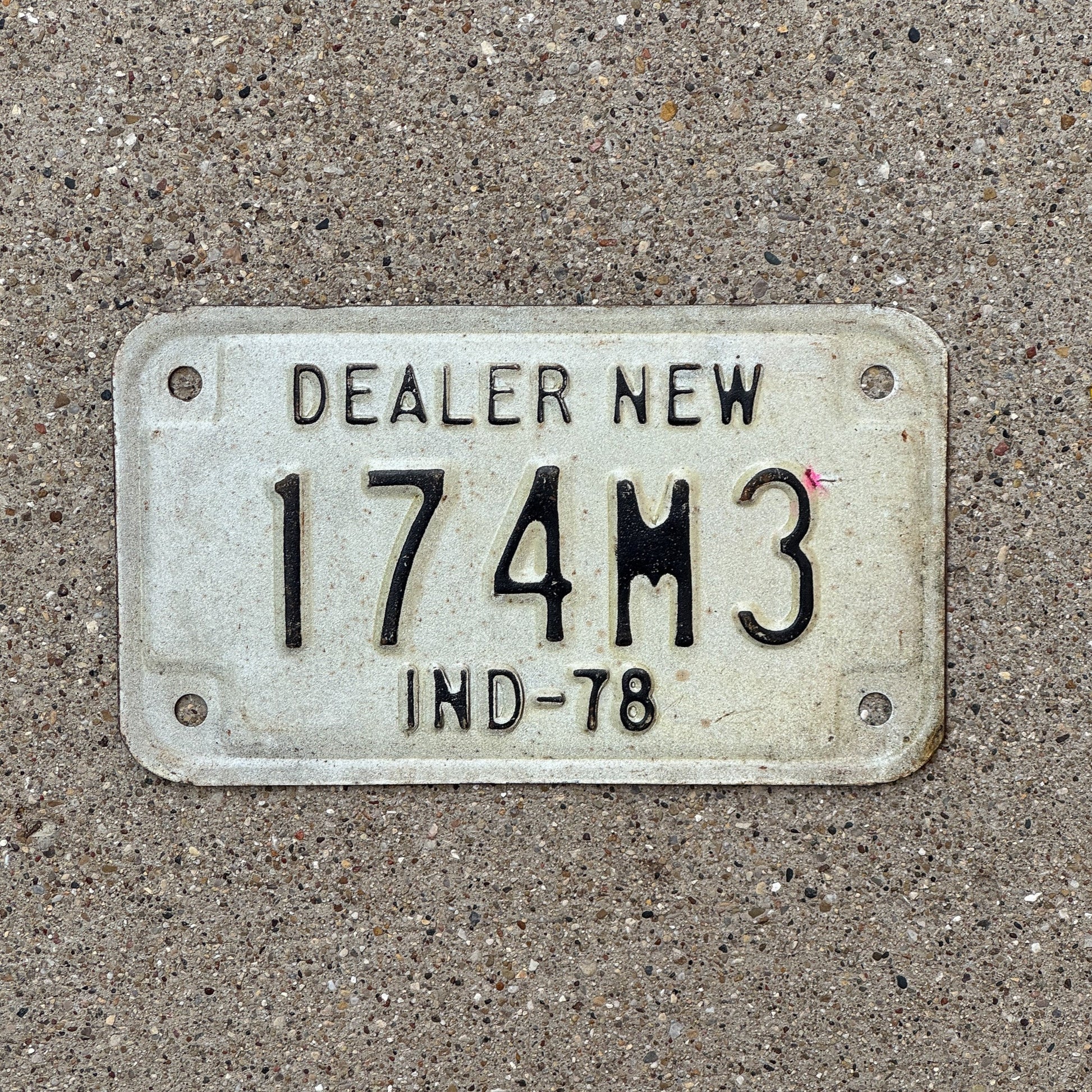 Photo of a 1978 Indiana Motorcycle Dealer License Plate Auto Tag Garage Decor Vintage 174 M 3 with original patina
