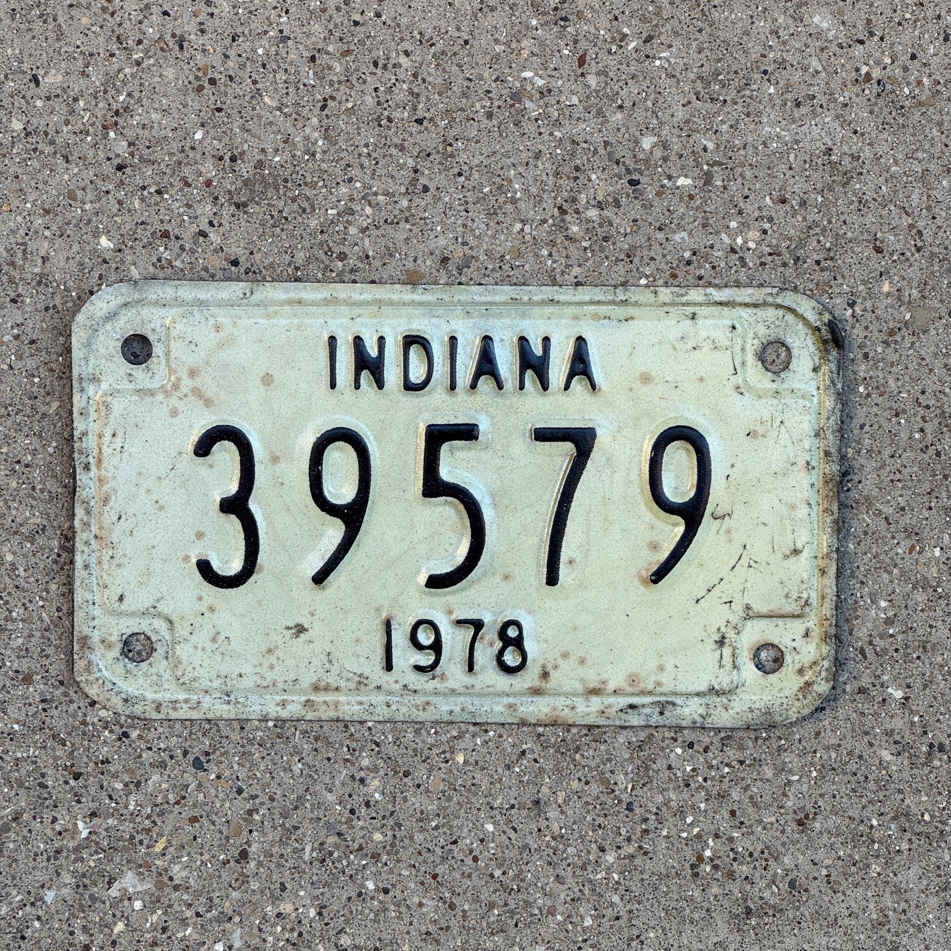 Photo of a 1978 Indiana Motorcycle License Plate Auto Tag Garage Decor Vintage 39579 with original patina