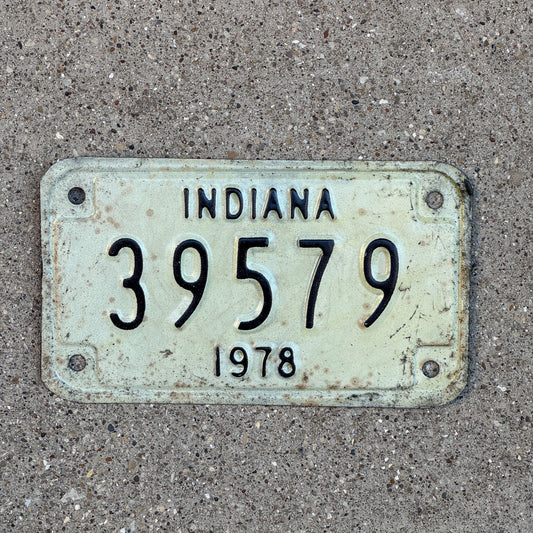 Photo of a 1978 Indiana Motorcycle License Plate Auto Tag Garage Decor Vintage 39579 with original patina