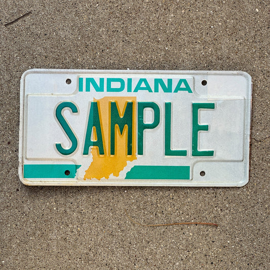 Photo of a 1978 Indiana Sample License Plate Auto Tag Garage Decor Vintage SAMPLE with original patina