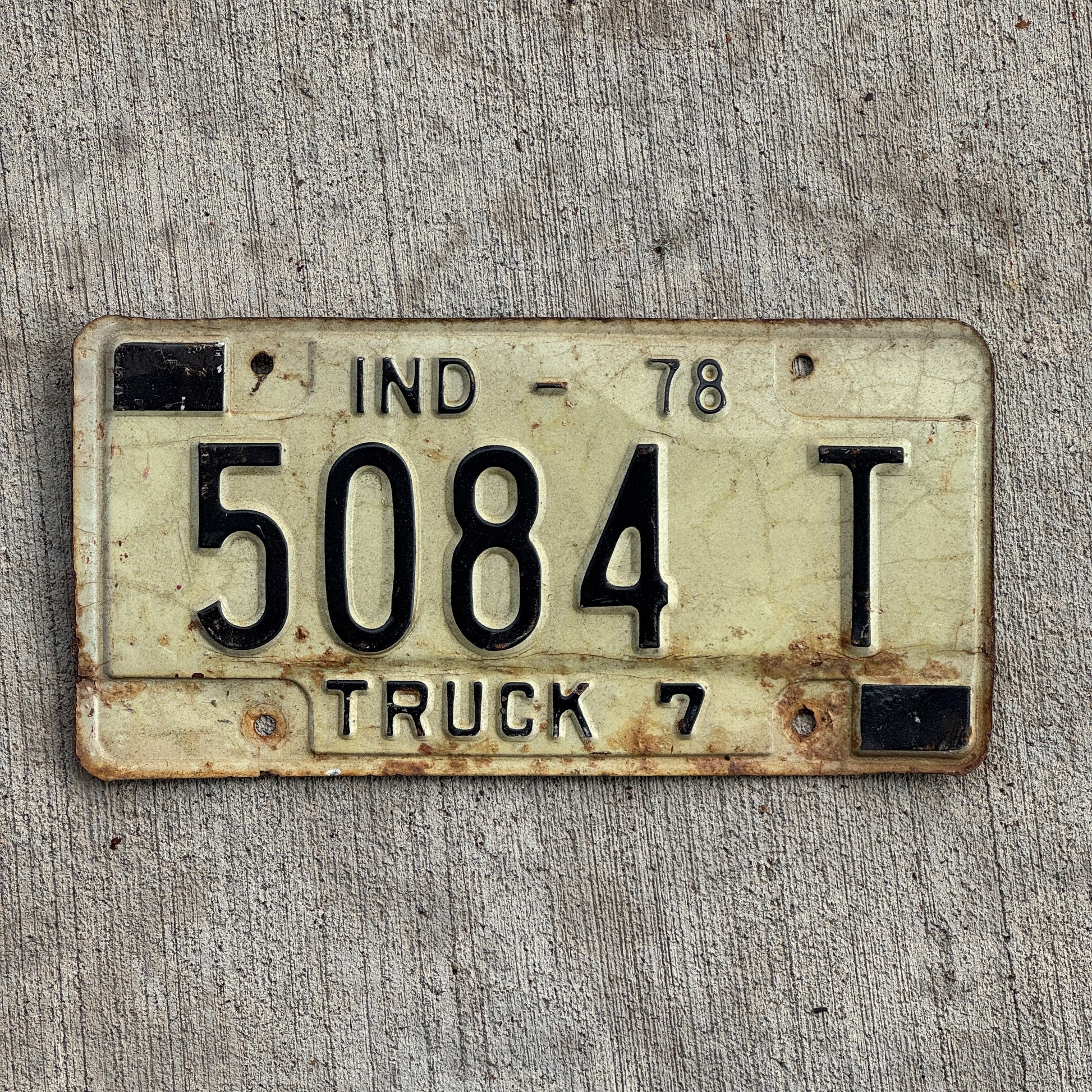Photo of a 1978 Indiana Truck License Plate Auto Tag Garage Decor Vintage 5084 T with original patina