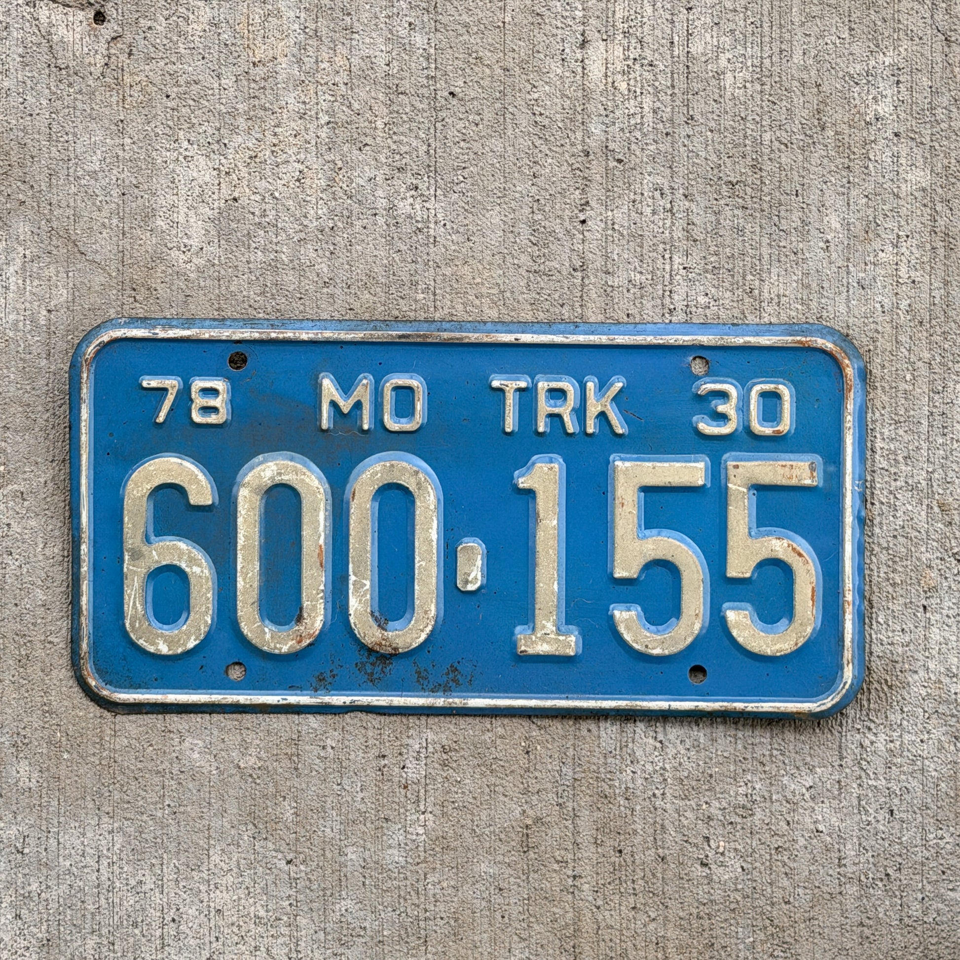 Photo of a 1978 Missouri Truck License Plate Auto Tag Garage Decor Vintage 600 155 with original patina