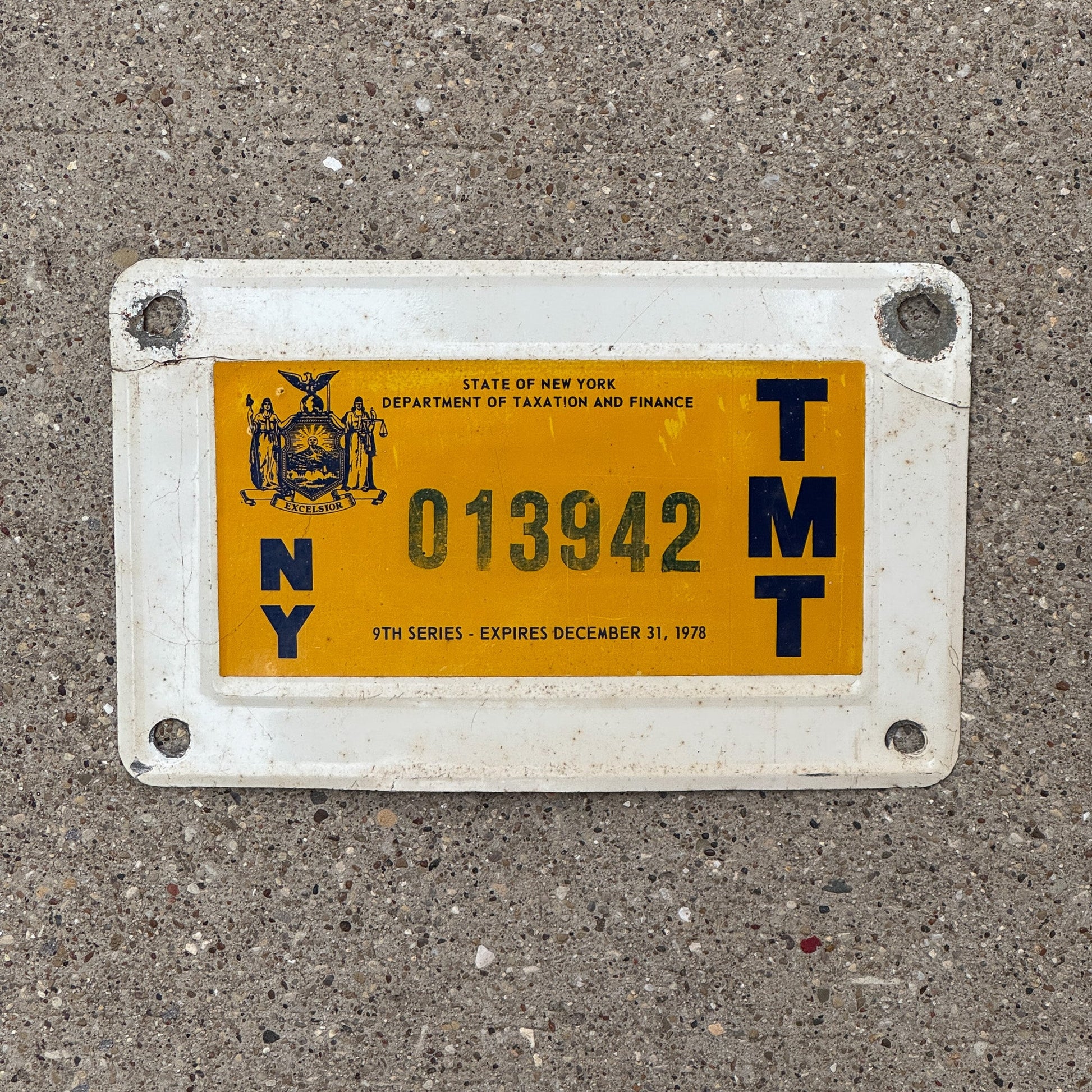 Photo of a 1978 New York Truck Mile Tax License Plate Auto Tag Garage Decor Vintage 9th Series 013942 with original patina