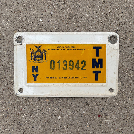 Photo of a 1978 New York Truck Mile Tax License Plate Auto Tag Garage Decor Vintage 9th Series 013942 with original patina