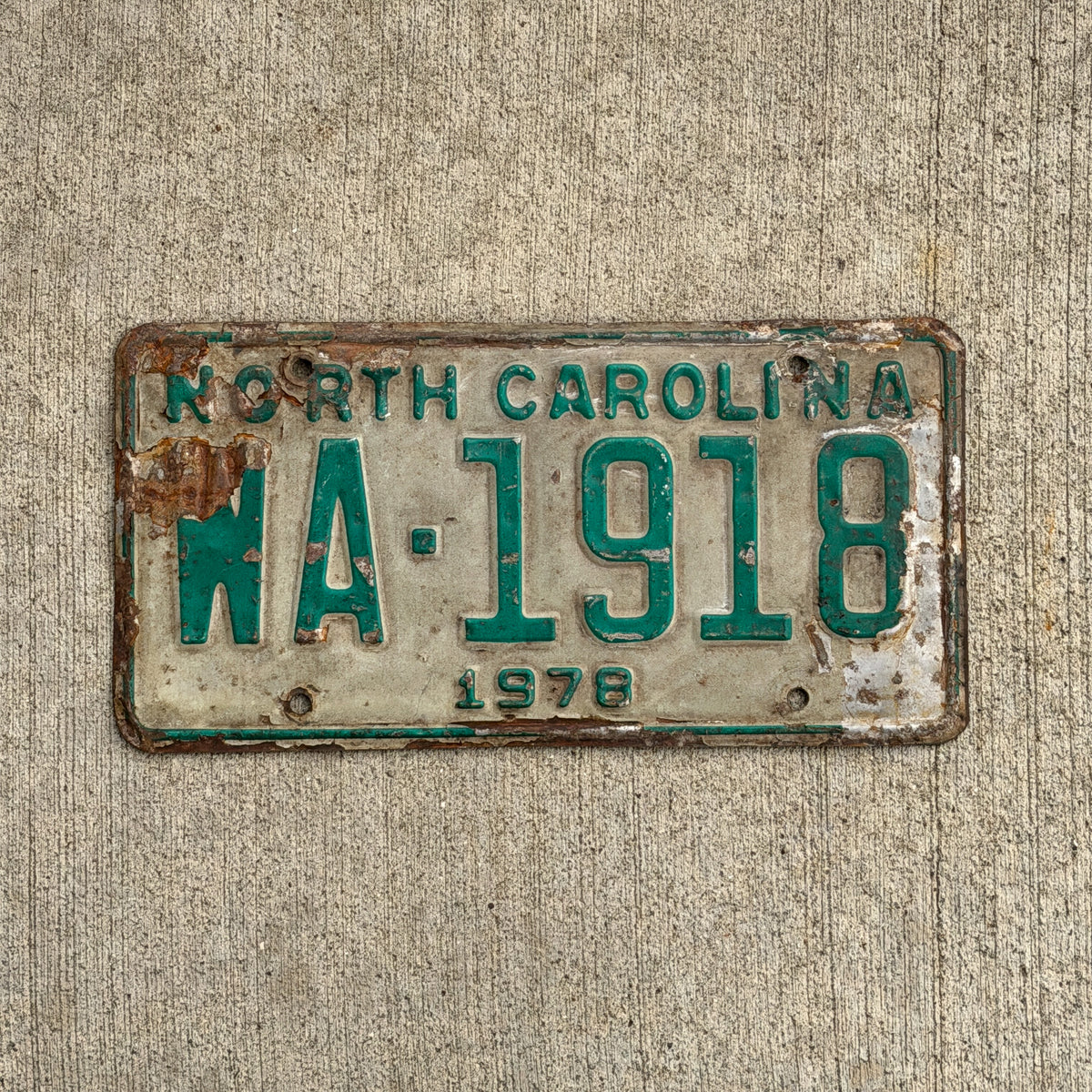 Photo of a 1978 North Carolina Common Carrier Truck License Plate Auto Tag Garage Decor Vintage WA 1918 with original patina
