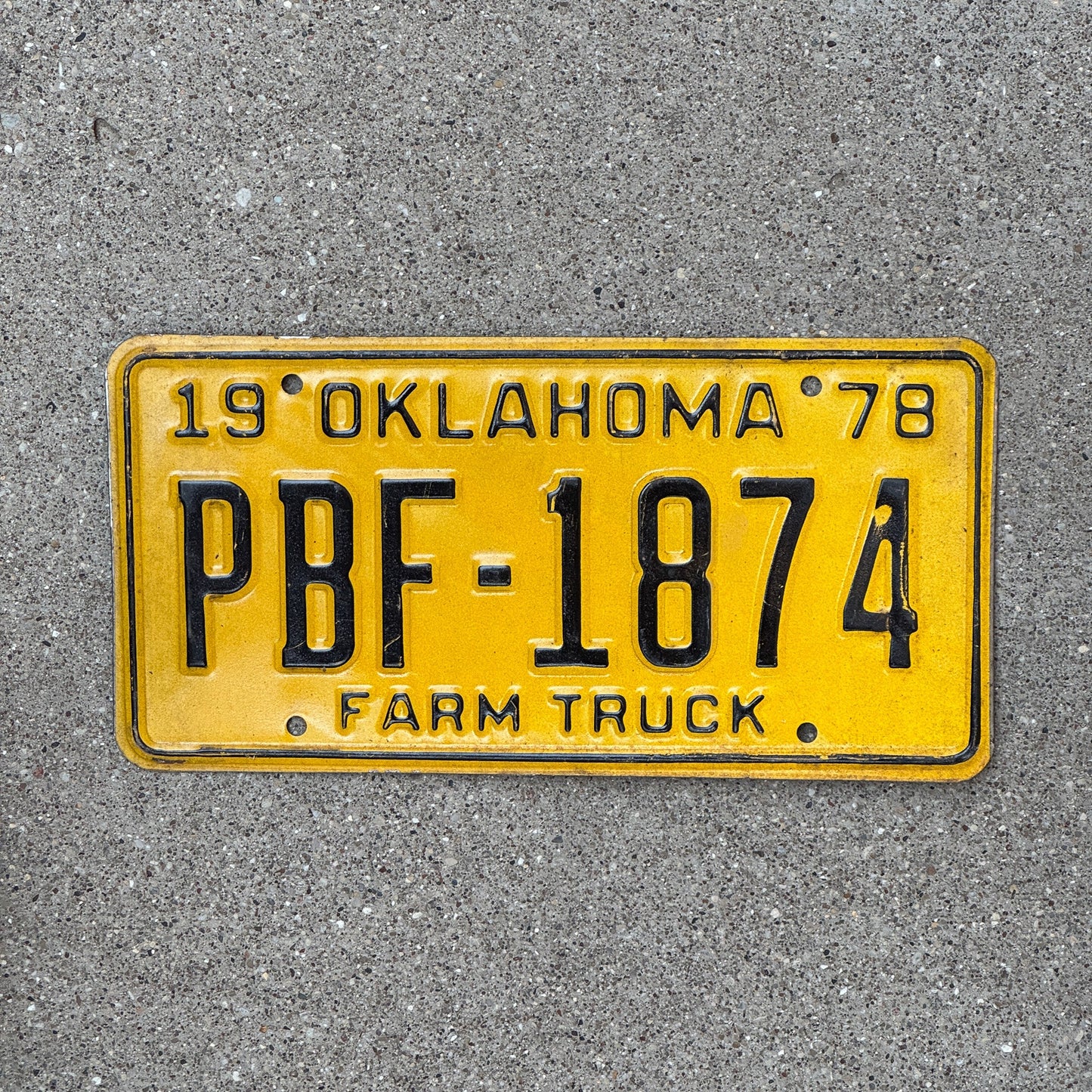 Photo of a 1978 Oklahoma Farm Truck License Plate Auto Tag Garage Decor Vintage PBF 1874