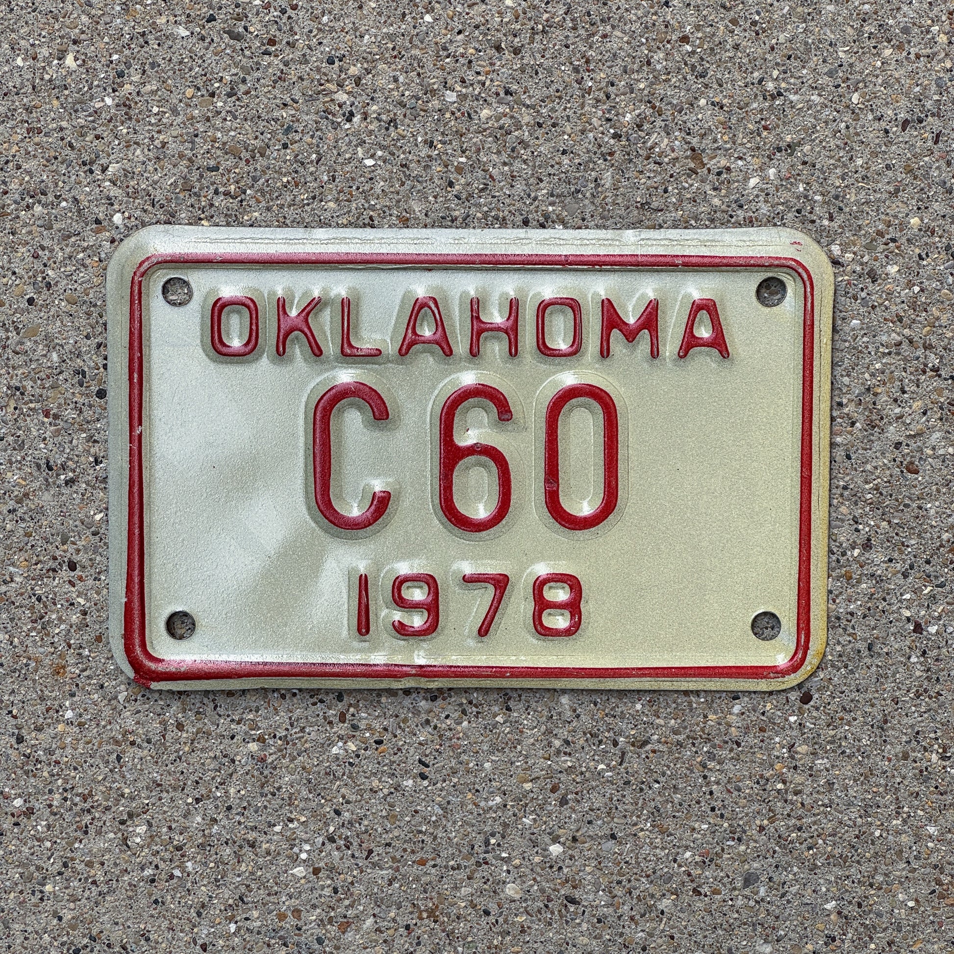 Photo of a 1978 Oklahoma Motorcycle License Plate Auto Tag Garage Decor Vintage C 60 with original patina