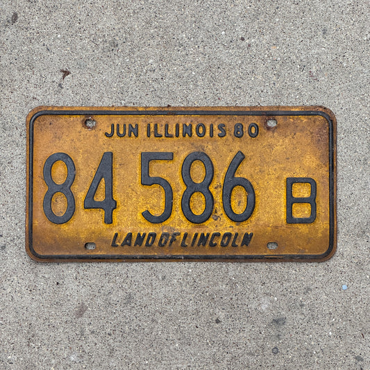 Photo of a 1979 1980 Illinois Truck License Plate Auto Tag Garage Decor Vintage 84 586 B with original patina