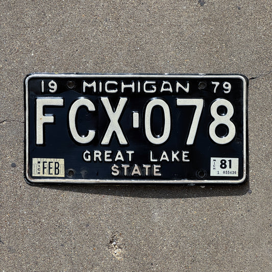 Photo of a 1979 1981 Michigan License Plate Auto Tag Garage Decor Vintage FCX 078 with original patina