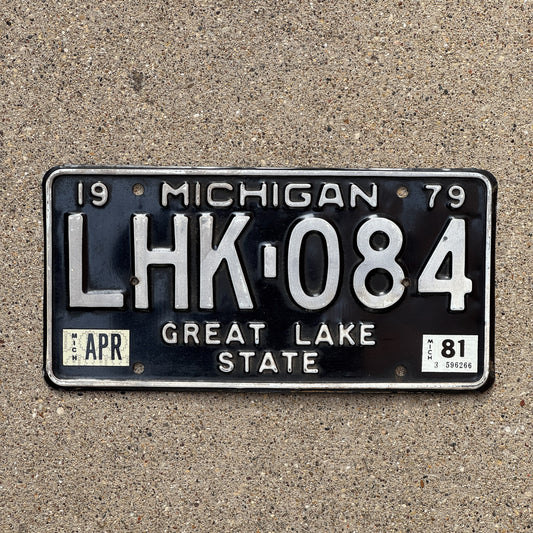 Photo of a 1979 1981 Michigan License Plate Auto Tag Garage Decor Vintage LHK 084 with original patina