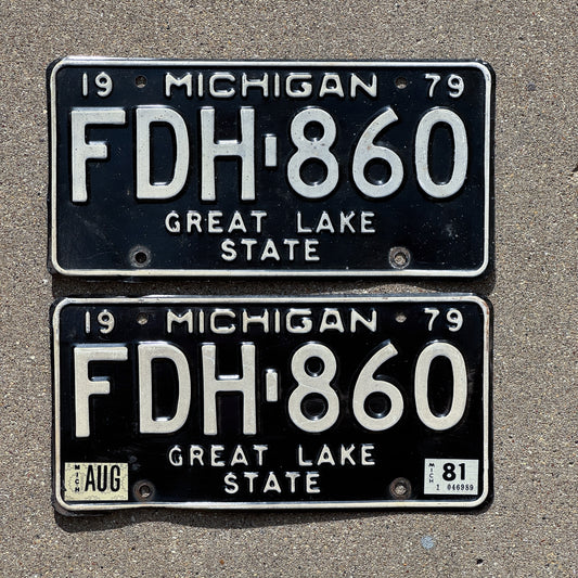 Photo of a 1979 1981 Michigan License Plate Pair Auto Tag Garage Decor Vintage FDH 860 with original patina