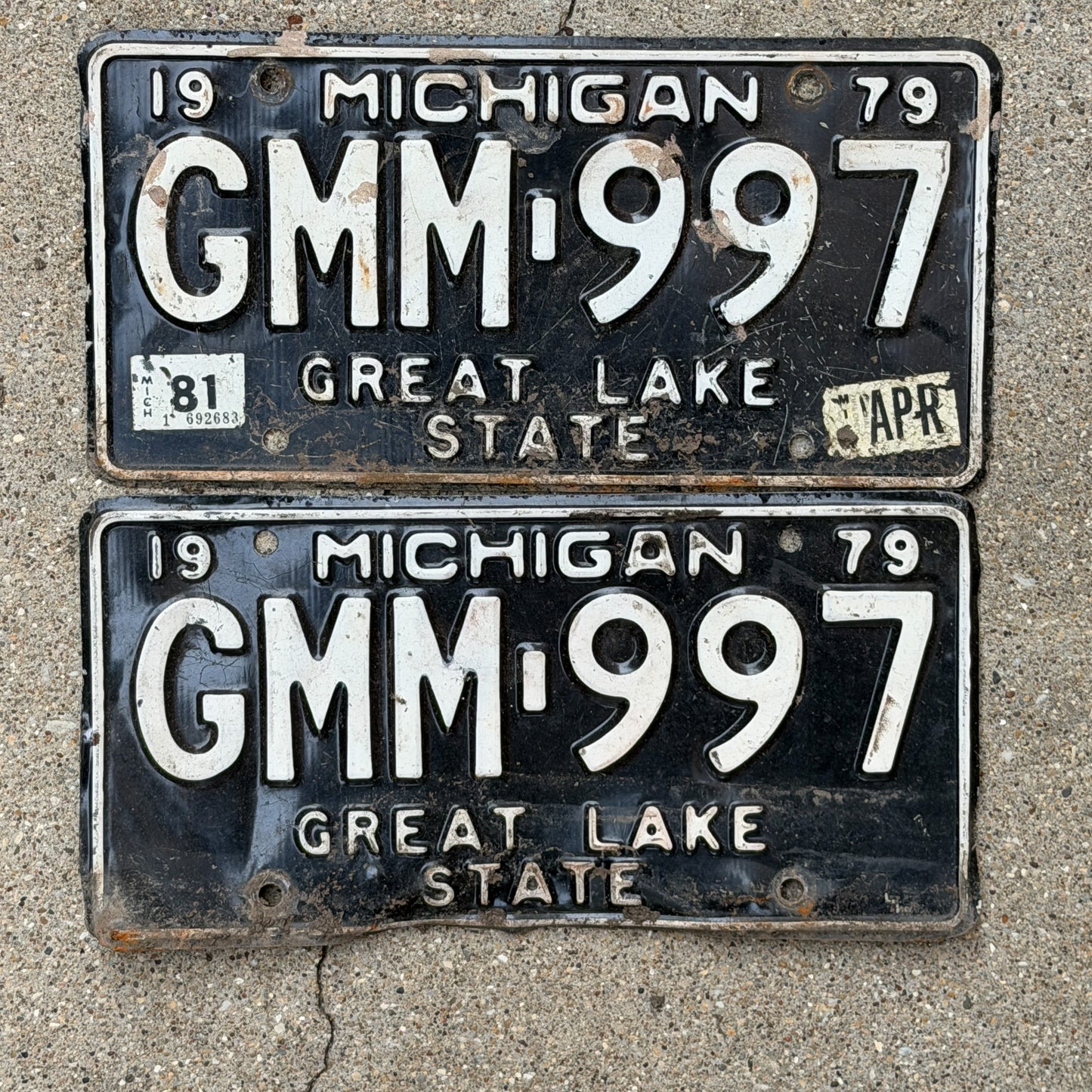 Photo of a 1979 1981 Michigan License Plate Pair Auto Tag Garage Decor Vintage GMM 997 with original patina