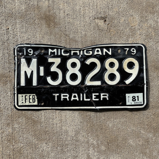 Photo of a 1979 1981 Michigan Trailer License Plate Auto Tag Garage Decor Vintage M 38289 with original patina
