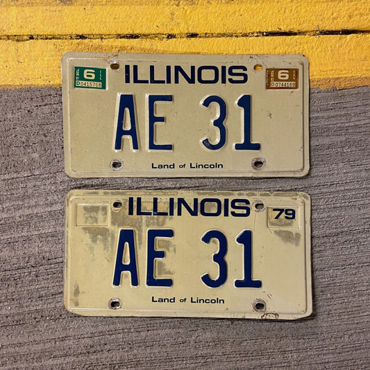 Photo of a 1979 1982 Illinois Vanity License Plate Pair Auto Tag Garage Decor Vintage AE 31 with original patina