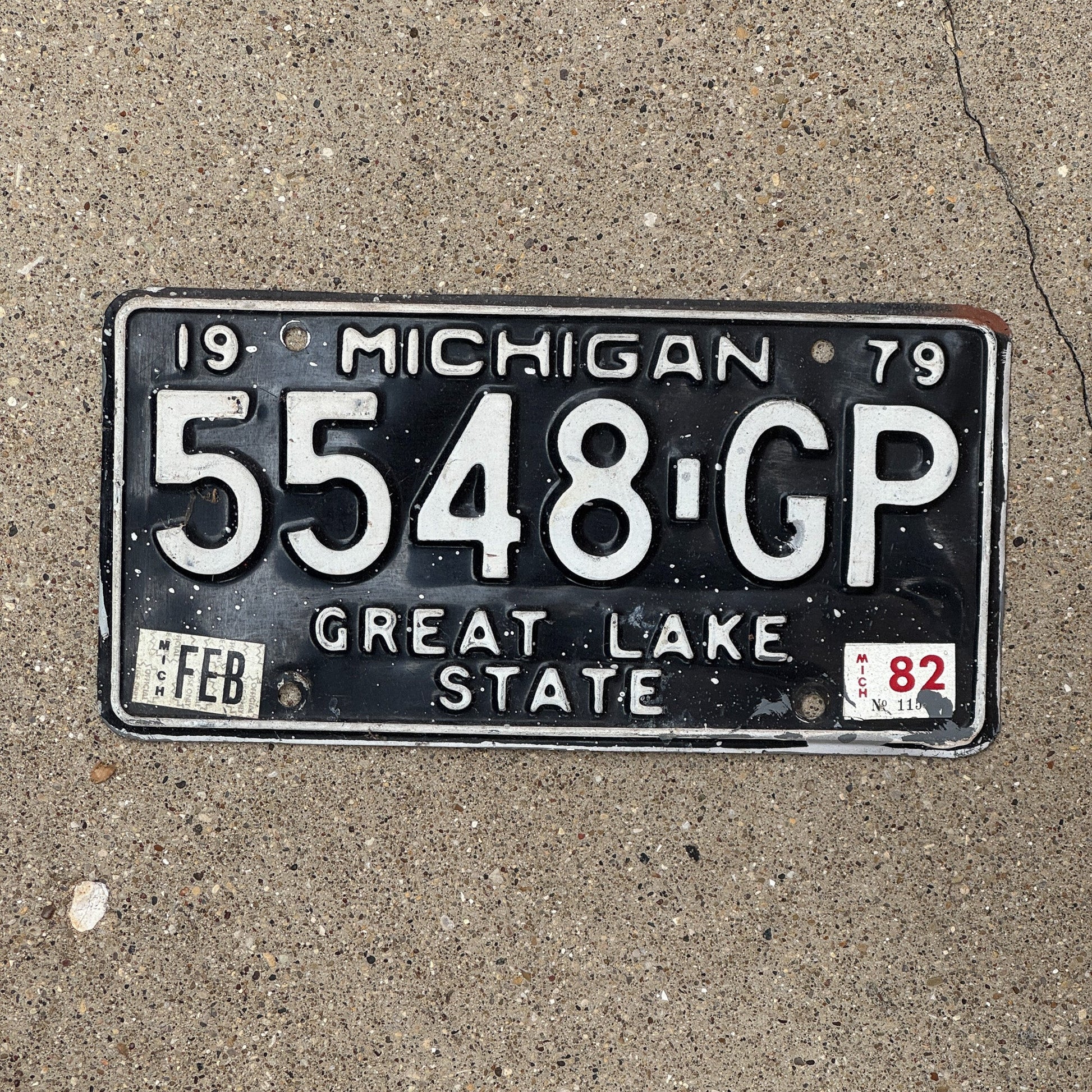 Photo of a 1979 1982 Michigan Commercial Truck License Plate Auto Tag Garage Decor Vintage 5548 GP