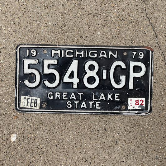 Photo of a 1979 1982 Michigan Commercial Truck License Plate Auto Tag Garage Decor Vintage 5548 GP