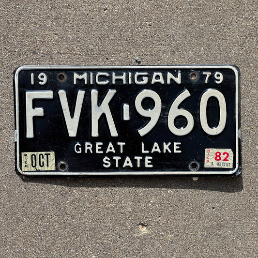 Photo of a 1979 1982 Michigan License Plate Auto Tag Garage Decor Vintage FVK 960 with original patina