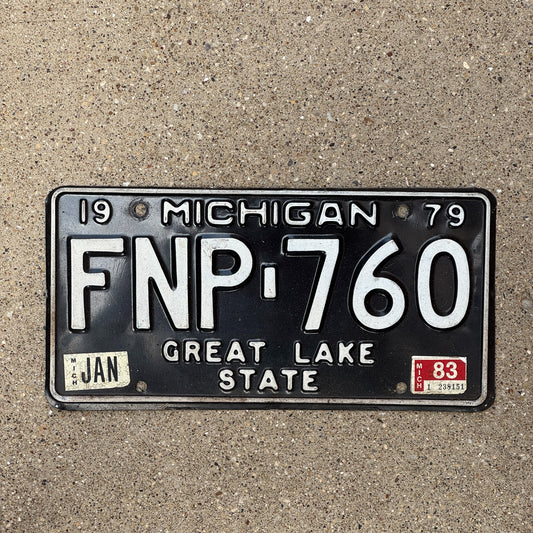 Photo of a 1979 1983 Michigan License Plate Auto Tag Garage Decor Vintage FNP 760