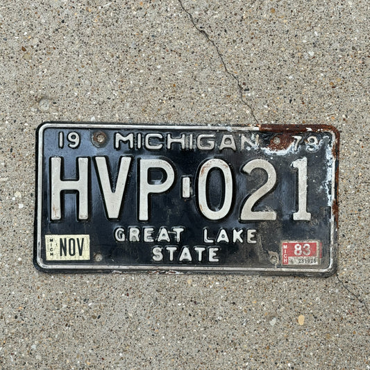 Photo of a 1979 1983 Michigan License Plate Auto Tag Garage Decor Vintage HVP 021 with original patina
