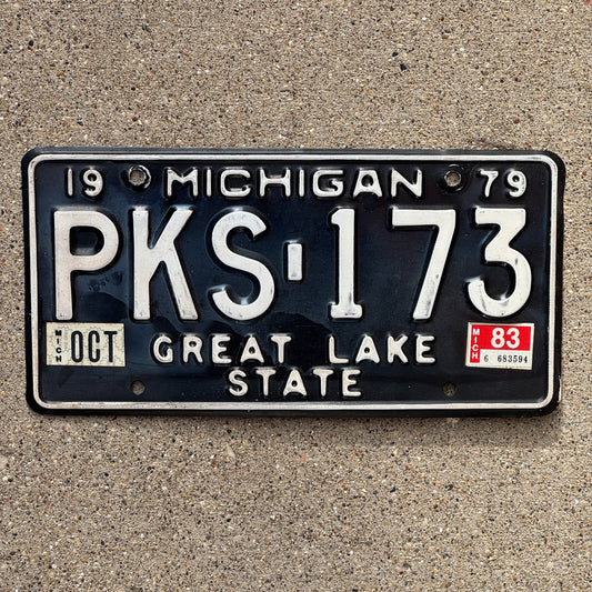 Photo of a 1979 1983 Michigan License Plate Auto Tag Garage Decor Vintage PKS 173 with original patina