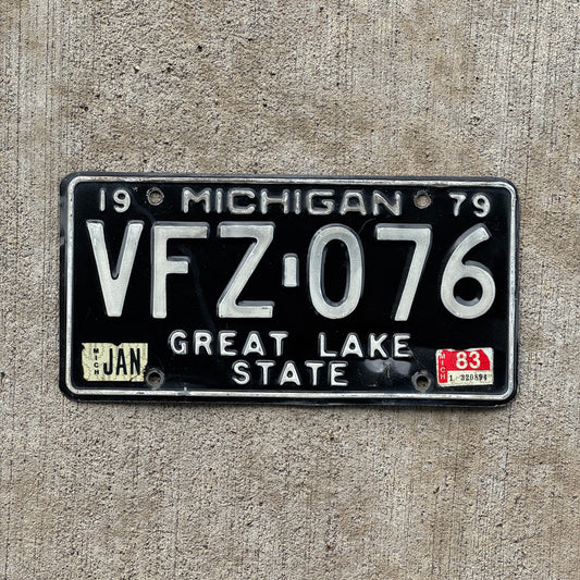 Photo of a 1979 1983 Michigan License Plate Auto Tag Garage Decor Vintage VFZ 076 with original patina